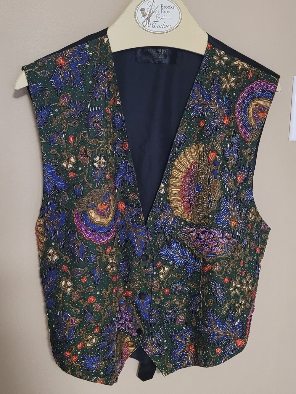 Black vest with intricate beading